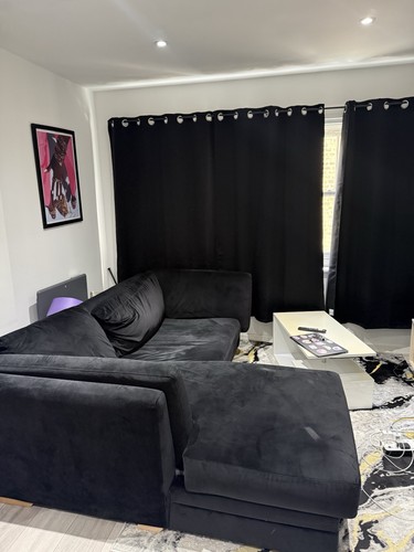 Black corner sofa with center - corner,